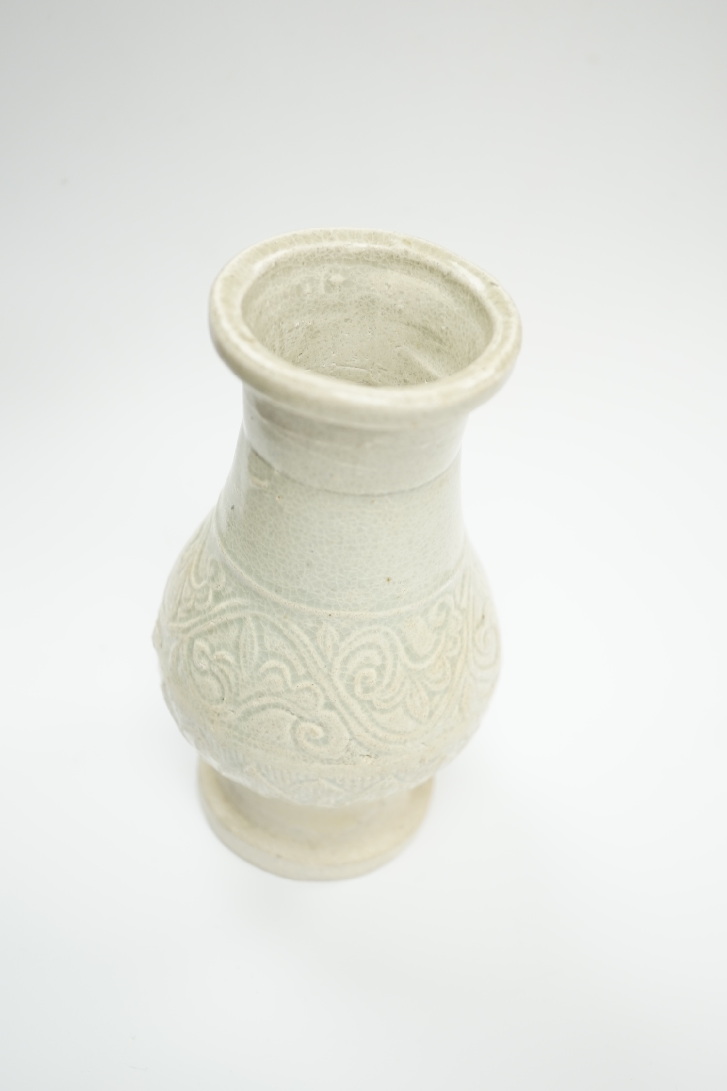 A Chinese moulded Qingbai vase, Song-Yuan dynasty, 14cm